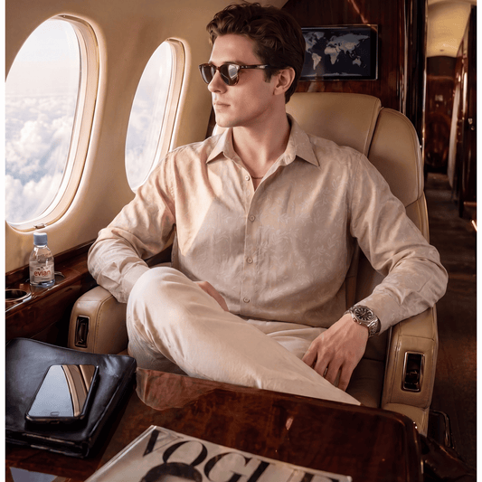 Light beige men's jacquard cotton shirt with leafy pattern on private jet