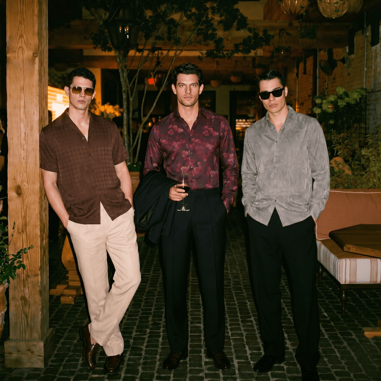 Stylish Men wearing premium club shirts in a bar