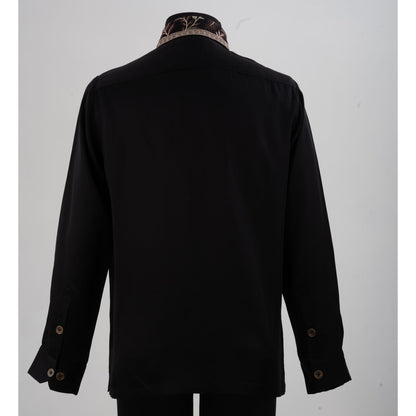 Back view of black linen-satin shirt showing smooth fabric and embroidered collar detail