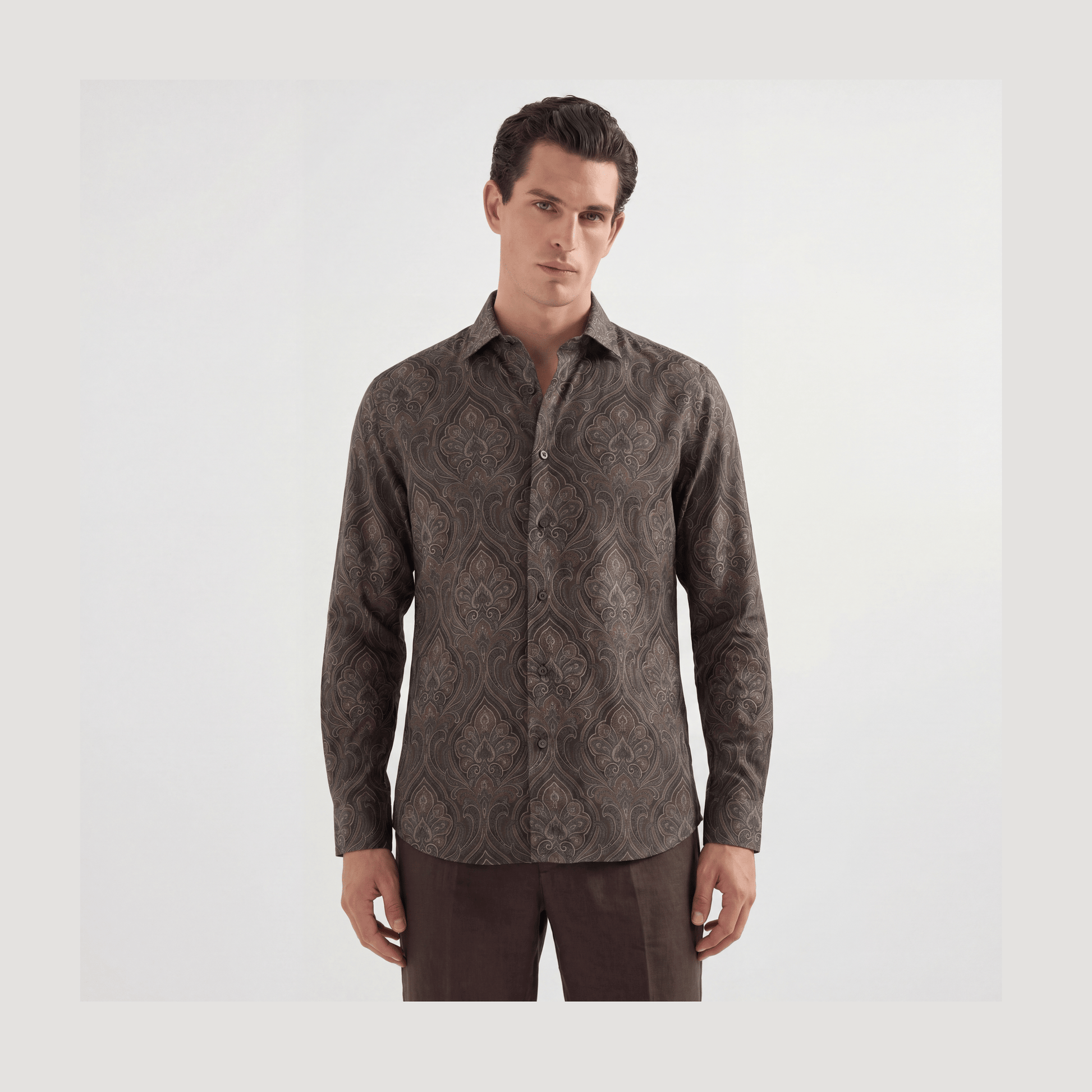 Brown and taupe paisley viscose button-up shirt on dark gray