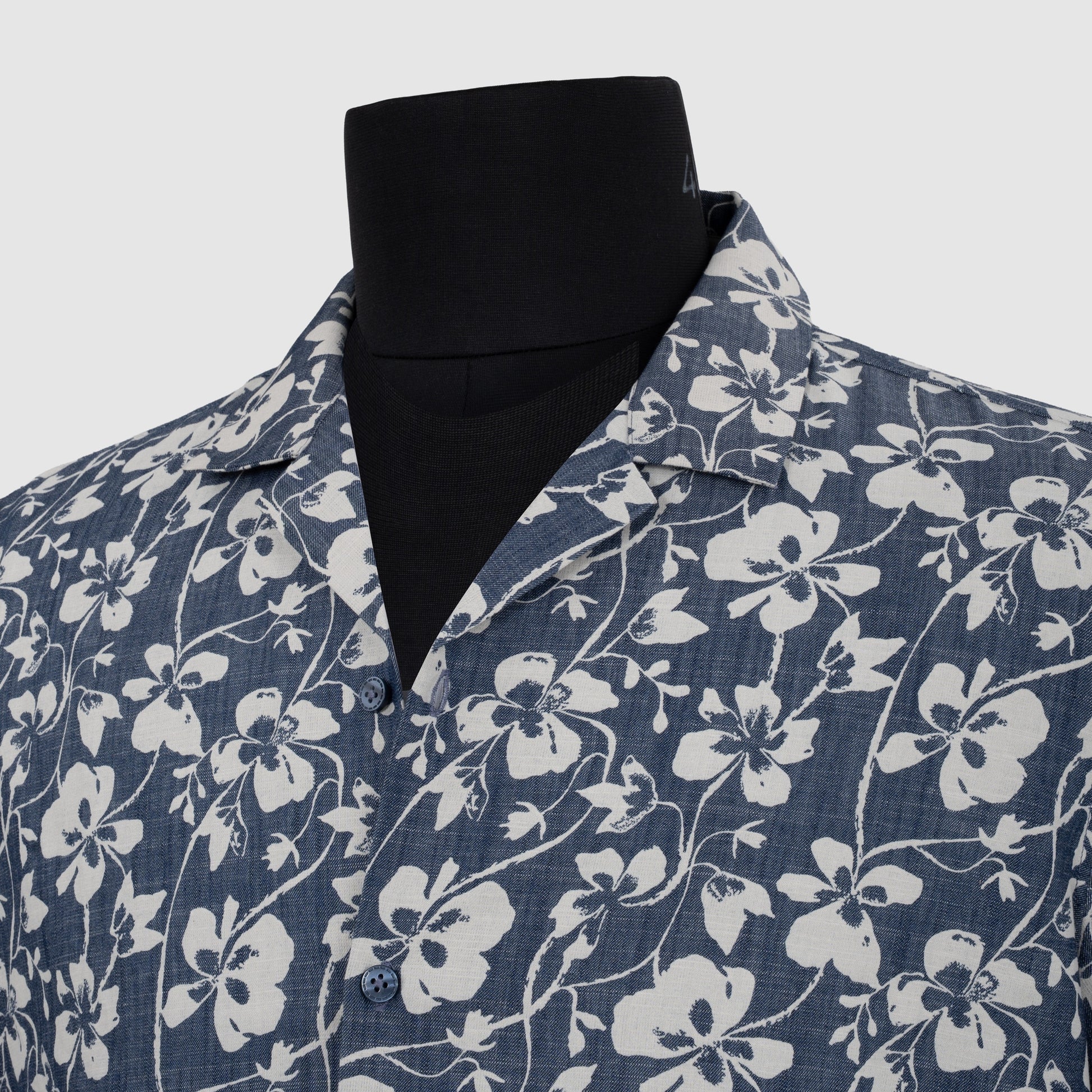 Navy blue Cuban collar cotton shirt with white floral vine pattern and dark buttons