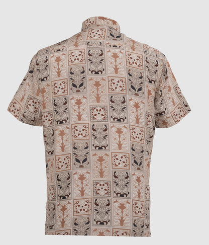 Back view of short-sleeved viscose shirt featuring earthy tone botanical print