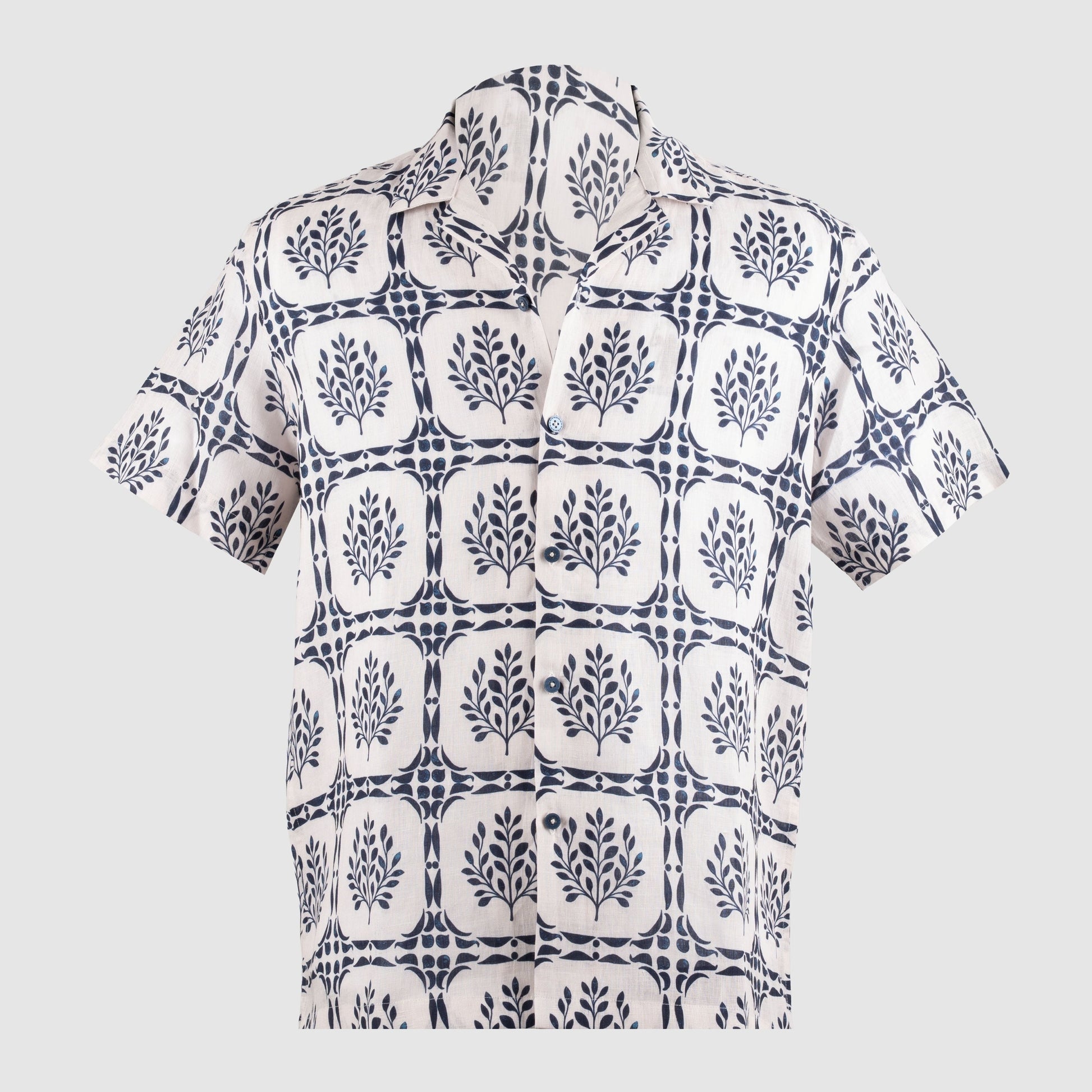 Front of hand-printed indigo linen Cuban shirt with button closure
