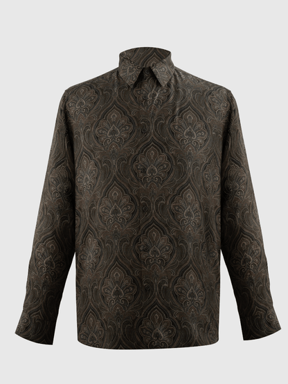 A long-sleeve button-up shirt with a dark brown and black damask pattern, displayed on a neutral light gray background.