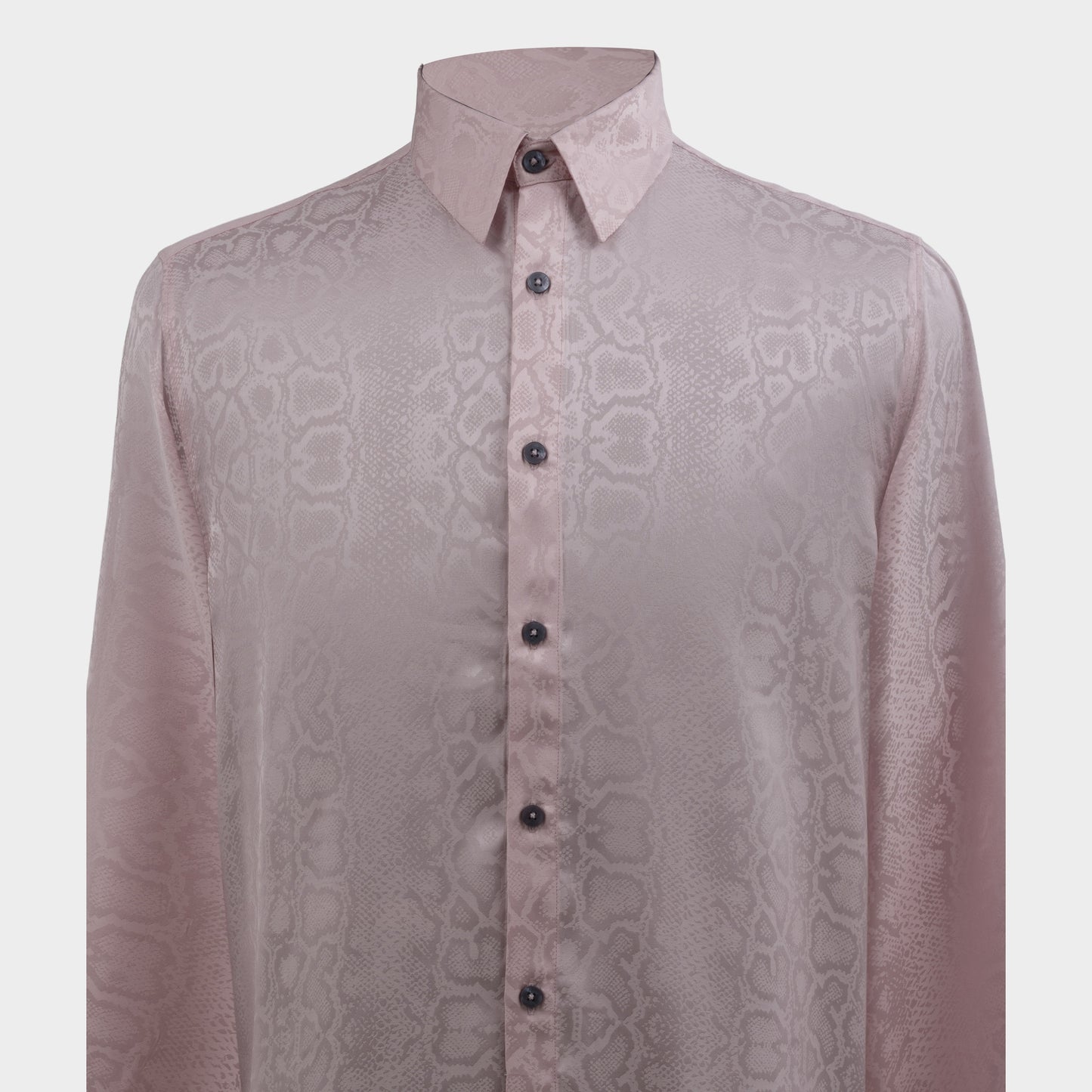 Close-up of pink viscose jacquard shirt showing tonal snakeskin weave texture