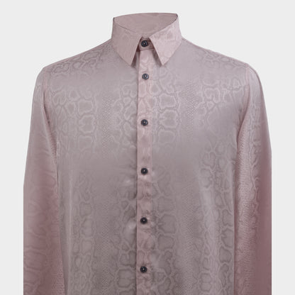 Close-up of pink viscose jacquard shirt showing tonal snakeskin weave texture