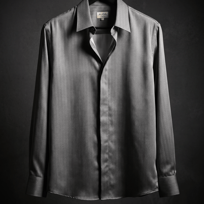 A dark gray long-sleeve button-down shirt with a subtle vertical texture, hanging on a black hanger against a dark gray background.