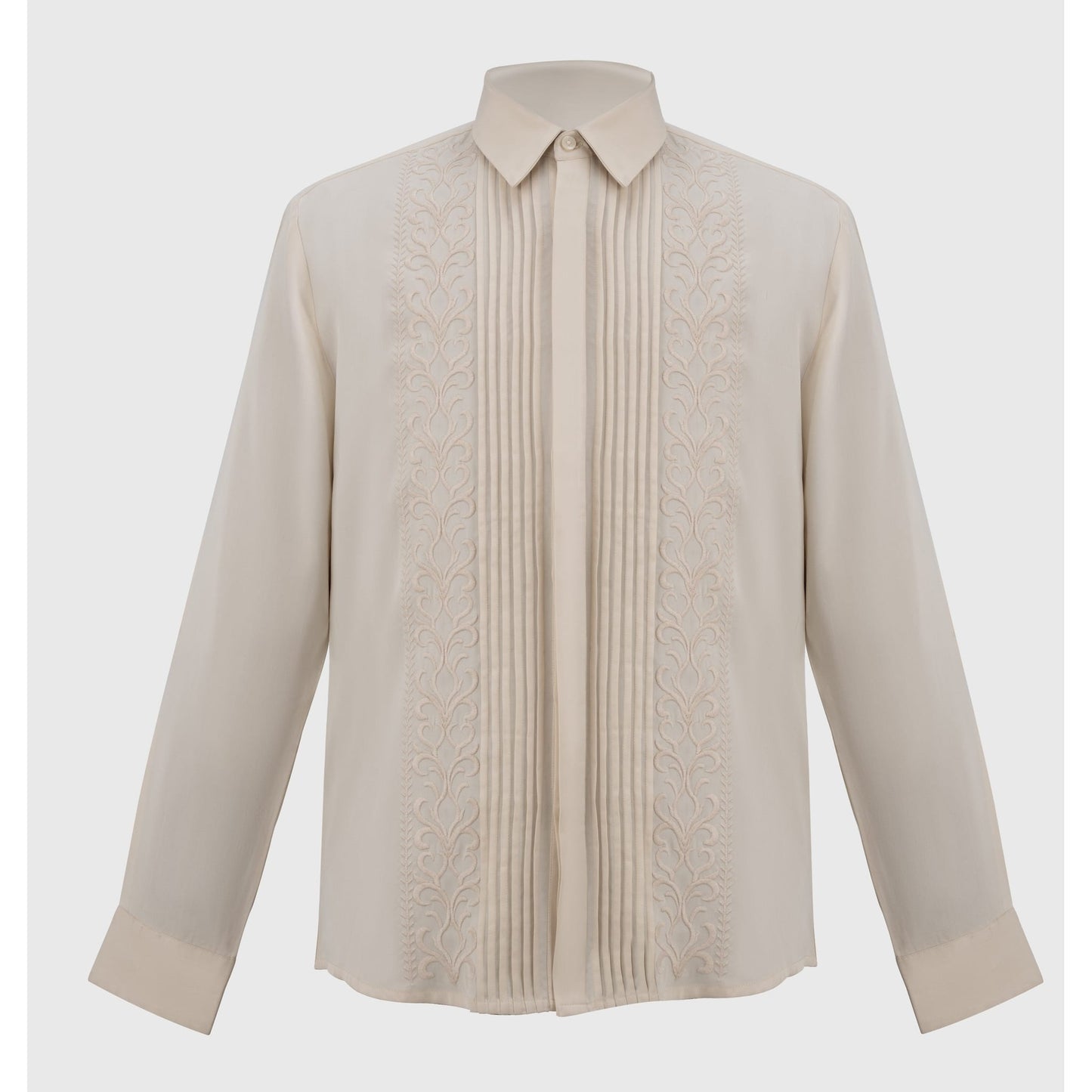 Flat lay of cream Tencel shirt showing vertical pleating and embroidery