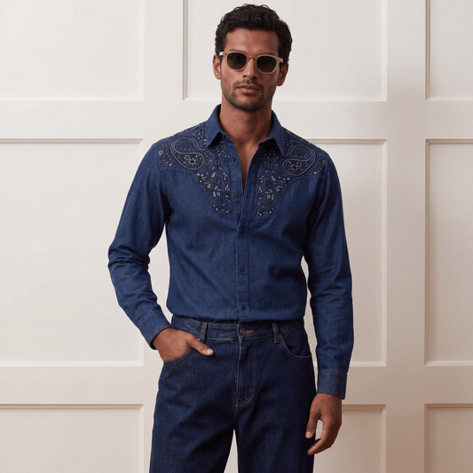 Navy blue ceremonial denim shirt paired with matching pants for fusion style