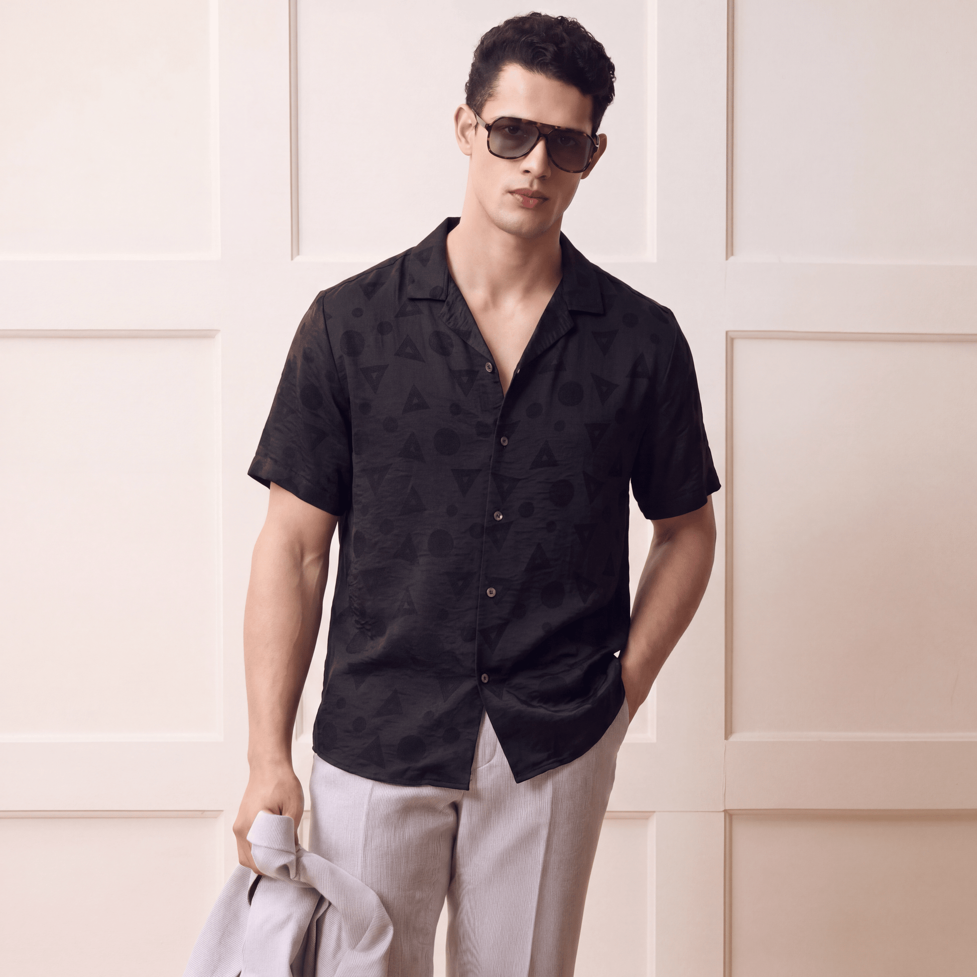 Black tonal geometric pattern short sleeve shirt side angle with blazer