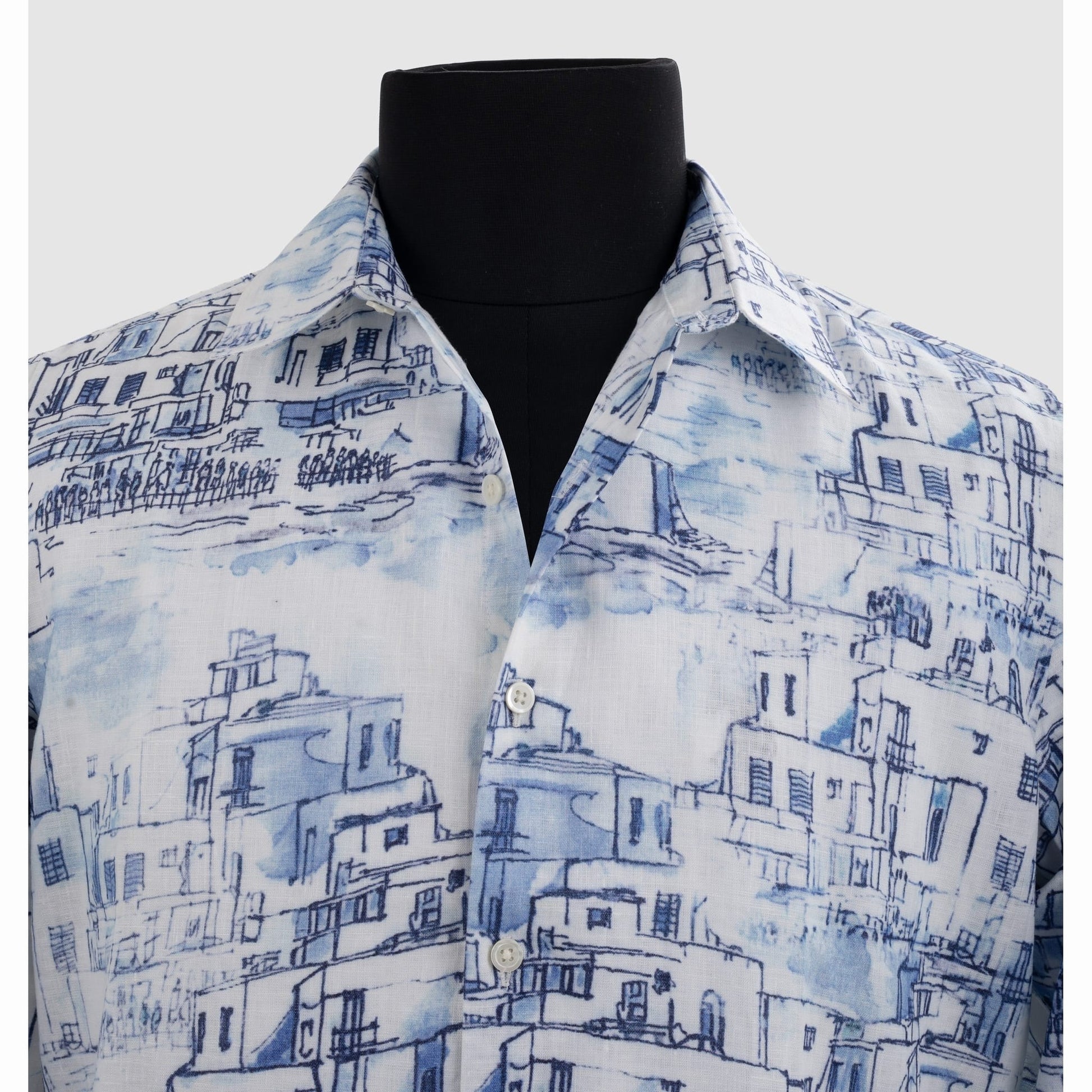 Close-up of natural linen texture and collar on architectural print shirt