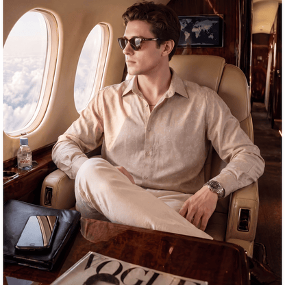 Light beige men's jacquard cotton shirt with leafy pattern on private jet