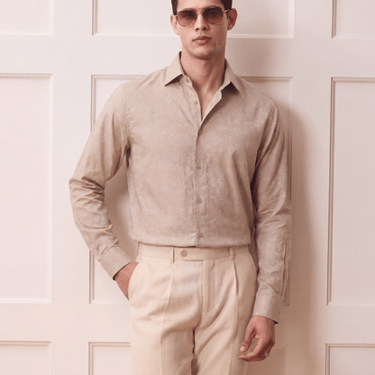 Men's light beige self-jacquard button-up shirt with regular collar and pleated trousers