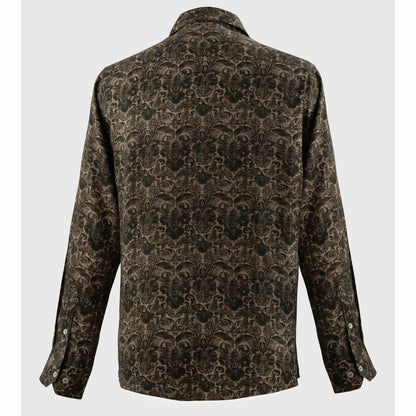 Back view of brown abstract print button-up with silver cuffs