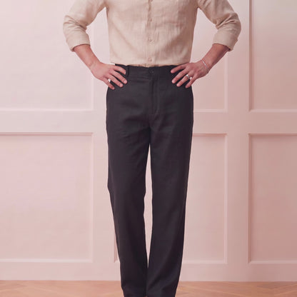 Man wearing black lyocell linen premium trousers